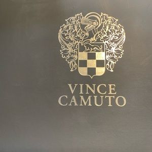 Excellent condition, black leather, zip side Vine Camuto sexy boot heel.